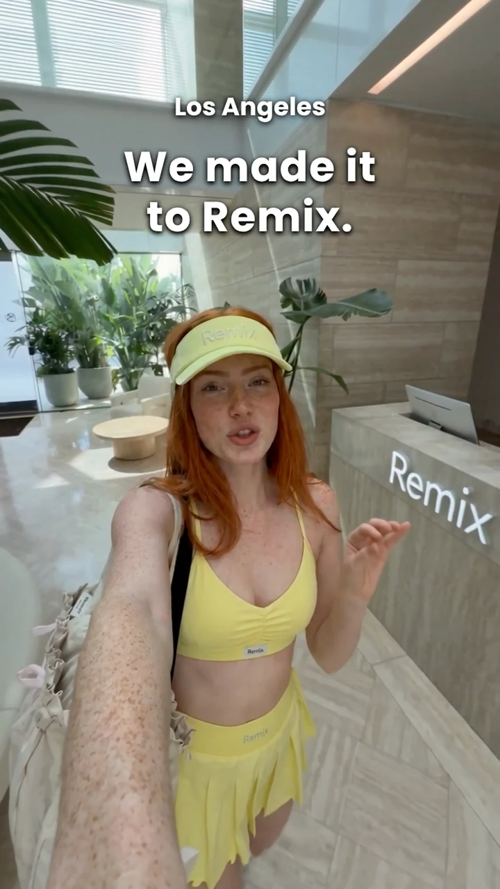 A presenter in lime activewear at the Remix Athletic Club reception